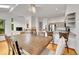 Spacious eat-in kitchen open to the living room, featuring granite countertops and stainless steel appliances at 766 Chimney Creek Dr, Golden, CO 80401