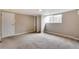 Cozy bedroom features carpeting, closet, and a window for natural light at 3216 Revere St, Aurora, CO 80011