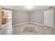 Open dining area with tiled floors, neutral paint, and access to the kitchen at 3216 Revere St, Aurora, CO 80011