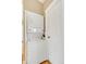 Convenient laundry closet with stacked washer and dryer unit and nearby door at 3216 Revere St, Aurora, CO 80011