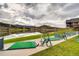 Community golf area near a serene lake with mountain views at 5565 Osage Way, Larkspur, CO 80118