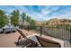Outdoor patio with ample seating and panoramic views, perfect for entertaining or relaxing in style at 5565 Osage Way, Larkspur, CO 80118