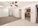Finished basement with carpet, tile, and open layout at 12333 Edwards Pl, Denver, CO 80239
