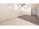 Finished basement with carpet and tiled floors at 12333 Edwards Pl, Denver, CO 80239