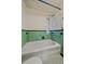 Clean bathroom featuring tile and shower and bathtub combo at 1410 Vine St # 1, Denver, CO 80206