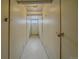 Storage units line a bright hallway providing organization solutions for residents at 1410 Vine St # 1, Denver, CO 80206