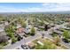 Aerial view of a neighborhood showcasing tree-lined streets and well-maintained homes in a suburban community at 7736 Vallejo St, Denver, CO 80221