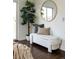 Bedroom corner with hardwood floors, sliding glass doors, white bench and decor at 3910 S Grant St, Englewood, CO 80113