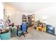 Home office with a desk, chair, and built-in shelving for storage at 1693 Carr St # A, Lakewood, CO 80214