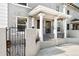 Inviting townhouse with classic architectural details and secure gated entry at 1914 E 16Th Ave, Denver, CO 80206