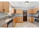 Well-equipped kitchen with stainless steel appliances and granite countertops at 1914 E 16Th Ave, Denver, CO 80206
