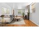 Bright living room with a cozy fireplace and modern decor at 1914 E 16Th Ave, Denver, CO 80206