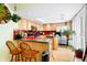 Bright kitchen with updated appliances, maple cabinets, and stylish backsplash at 13304 E Asbury Dr, Aurora, CO 80014