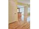 Bright living room features light hardwood floors, an open layout and natural light at 13304 E Asbury Dr, Aurora, CO 80014