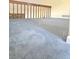 Carpeted loft area with railing overlooking the lower level, creating an open feel at 13304 E Asbury Dr, Aurora, CO 80014
