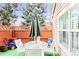 Outdoor patio featuring seating and a glass table for outdoor dining at 13304 E Asbury Dr, Aurora, CO 80014