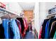 Walk-in closet featuring shelving and hanging storage for maximum organization at 13304 E Asbury Dr, Aurora, CO 80014