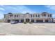 Attractive townhome with an attached garage, private balconies, and well-maintained landscaping at 9023 Apache Plume Dr # C, Parker, CO 80134