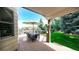 Outdoor deck area with patio furniture, offering a relaxing and inviting space for enjoying the surroundings at 76 Buckthorn Dr, Littleton, CO 80127