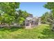 Exterior of home showcasing a spacious back deck, perfect for outdoor entertaining at 5 Cliffrose, Littleton, CO 80127