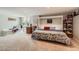 Finished bedroom with a built-in window seat and murphy bed in the basement at 5 Cliffrose, Littleton, CO 80127