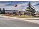 Ken-Caryl Ranch Community Center and surrounding landscaping with mountains in background at 5 Cliffrose, Littleton, CO 80127