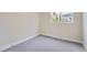 Cozy carpeted bedroom with a window providing natural light at 2888 S Fundy St, Aurora, CO 80013