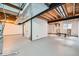 Unfinished basement featuring mechanicals, concrete floors, and exposed ceiling at 2685 S Dayton Way # 67, Denver, CO 80231