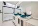 Beautiful bathroom with blue glass vessel sinks and a walk-in shower with black trim at 2685 S Dayton Way # 67, Denver, CO 80231