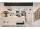 Modern kitchen with white cabinets, quartz countertops, and stainless steel appliances at 2685 S Dayton Way # 67, Denver, CO 80231