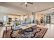 Bright living room featuring an open floor plan, hardwood floors, and inviting decor at 1766 Summerglow Ln, Monument, CO 80132