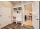Welcoming mudroom with built-in storage and seating, providing a convenient transition from outdoors at 1766 Summerglow Ln, Monument, CO 80132