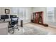 Dedicated home office with ample natural light, perfect for work and productivity with hardwood floors at 1766 Summerglow Ln, Monument, CO 80132