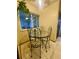 Bright breakfast nook with table, chairs, and window that provides a view of an outdoor patio at 12973 E Cornell Ave, Aurora, CO 80014