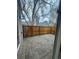 Private brick patio enclosed by a wooden fence for outdoor relaxation and entertainment at 12973 E Cornell Ave, Aurora, CO 80014