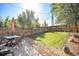 Fenced backyard with a grassy area and patio at 921 Raleigh St, Denver, CO 80204