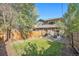 Spacious backyard with patio and wood fence at 921 Raleigh St, Denver, CO 80204