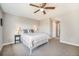 Bright bedroom with ceiling fan, double door closet and neutral walls at 921 Raleigh St, Denver, CO 80204