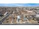 Aerial view of the neighborhood showcasing the unique home with Quonset hut style building at 410 Goodrich Ave, Platteville, CO 80651