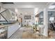 Kitchen with stainless steel appliances, concrete countertops, and a unique open design at 410 Goodrich Ave, Platteville, CO 80651