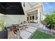 Backyard featuring patio, stone walkway, outdoor dining, landscaping and easy access to house at 20998 E 60Th Pl, Aurora, CO 80019