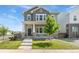 Charming two-story home with landscaped front yard and inviting porch at 20998 E 60Th Pl, Aurora, CO 80019