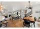 Open concept kitchen and living area with natural light and modern design at 20998 E 60Th Pl, Aurora, CO 80019