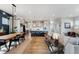 Spacious open-concept living area with modern kitchen and dining at 20998 E 60Th Pl, Aurora, CO 80019