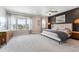 Primary bedroom features lots of natural light, neutral color palette, and modern decor at 20998 E 60Th Pl, Aurora, CO 80019