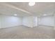 Spacious finished basement featuring neutral carpet, white walls and ceiling with recessed lighting at 1700 W 102Nd Ave, Thornton, CO 80260