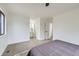 Bedroom with carpet and attached bathroom at 1700 W 102Nd Ave, Thornton, CO 80260