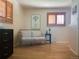 Comfortable living space with wood floors and a shuttered window for natural light at 3643 E Lake Dr, Centennial, CO 80121