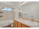 Bathroom featuring a bathtub, shower, and single sink with vanity at 17303 E Dewberry Cir, Parker, CO 80134