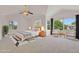 Spacious main bedroom with high ceilings, large windows, and neutral decor, providing a relaxing retreat at 17303 E Dewberry Cir, Parker, CO 80134